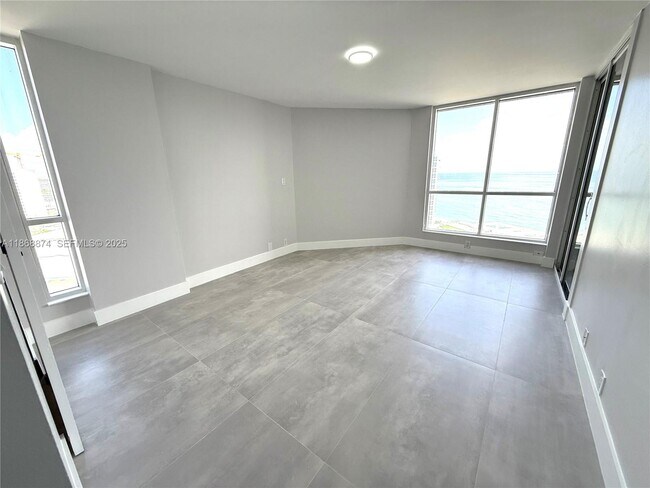 Building Photo - 6767 Collins Ave