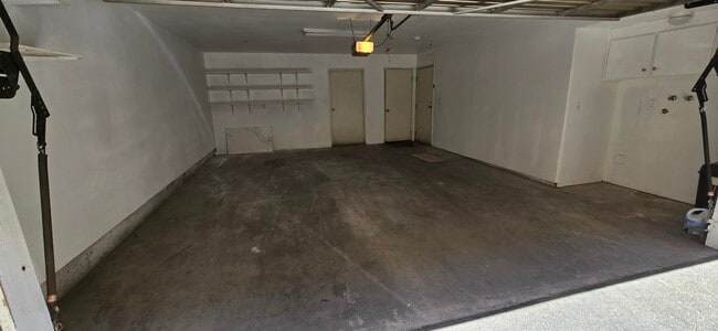 2-car garage with 150 lineal feet of added shelvingshelving - 14365 Foothill Blvd