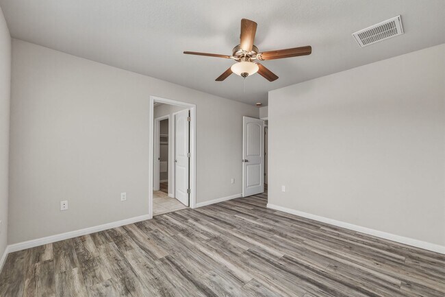 Building Photo - Gated Community Home with Solar Panels & All Appliances Included