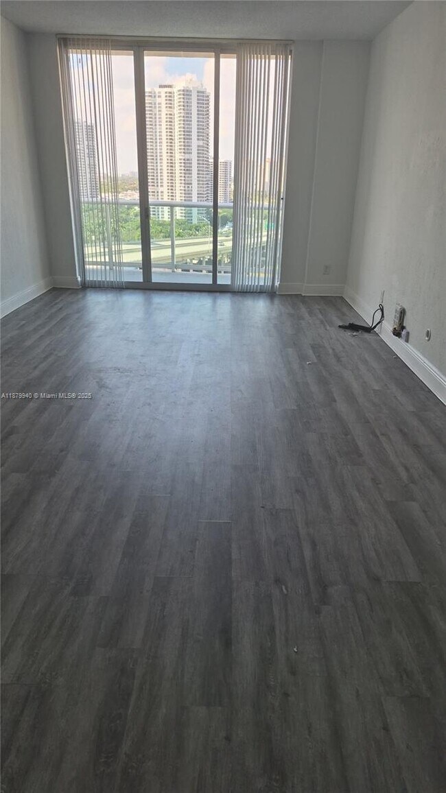 Building Photo - 19390 Collins Ave