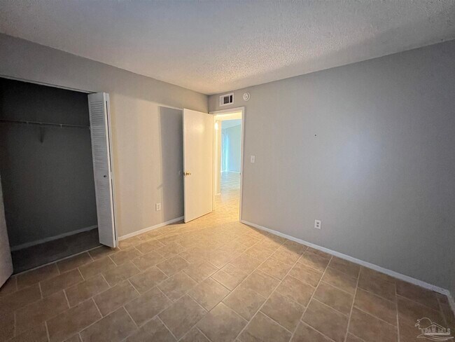 Building Photo - 6809 Tiki Ln