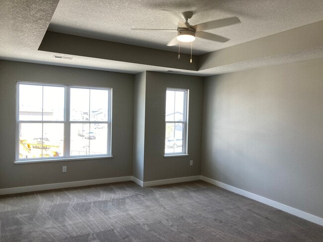 Building Photo - Spacious 4-Bedroom Home with 2-Car Garage & Yard