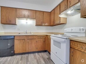 Building Photo - 3 Bedroom Apartment with new flooring and ...