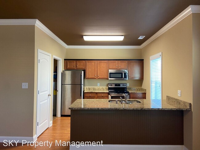 Building Photo - 1 br, 1 bath Apartment - Village at Tradit...