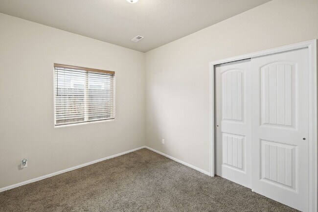 Building Photo - Spacious 4-Bedroom Home with Loft, Solar & Fenced Backyard