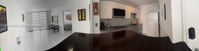 Building Photo - 5555 Collins Ave