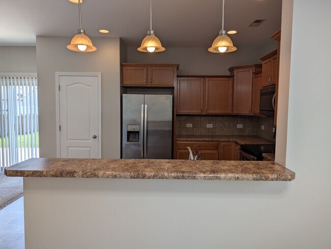 Building Photo - Pristine, move in ready Home located in th...