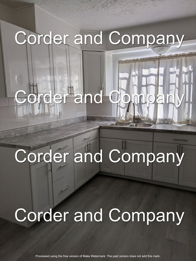 Building Photo - 211-1211 Adams St NE