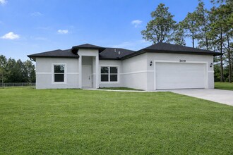 Building Photo - JUST BUILT! Spacious 4/2/2 Home -Perfect for Your Family in SW Lehigh Acres