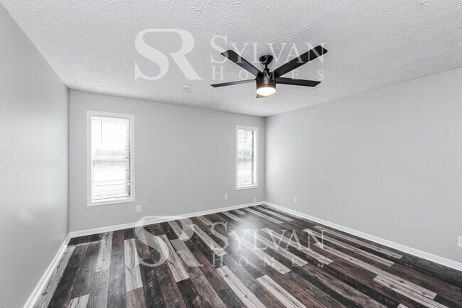 Building Photo - This lovely home is ready for your personal touch!