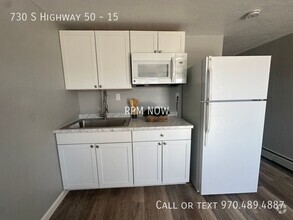 Building Photo - Updated Unit with Hard floors! Utilities i...