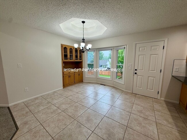 Building Photo - Spacious 3 Bedroom Home with Finished Basement, Covered Deck & Fenced Yard