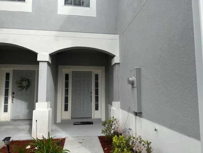 Building Photo - MOVE IN AUGUST! Beautiful 3 bed 2.5 bath townhome with large screened in back porch & 1 car attac...