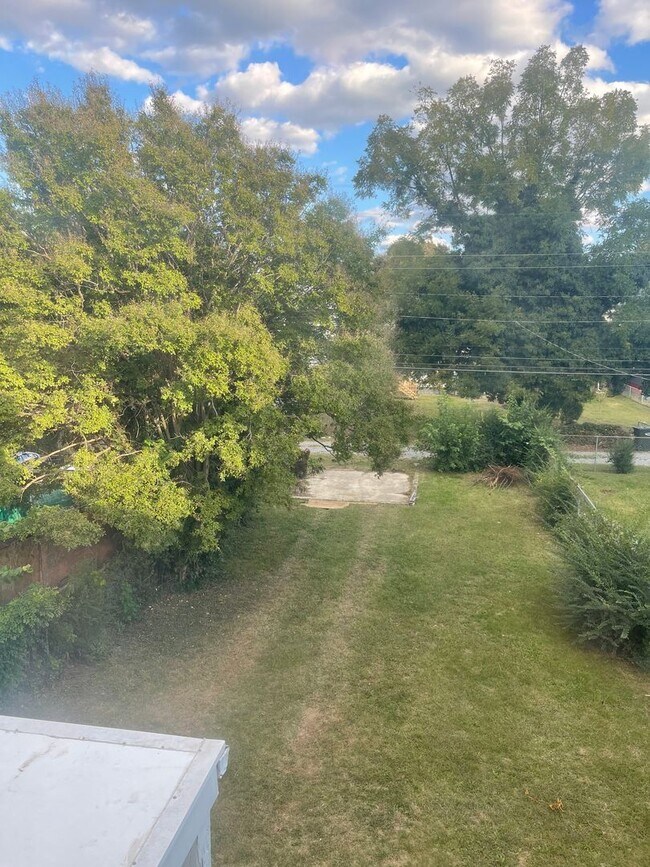 Building Photo - Large house on the North Side of town! Central HVAC, Laundry, Large yard, all appliances.