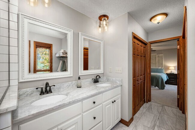 Building Photo - Stunning Remodeled 4BR Home w/ Pond View & 3-Seasons Porch!