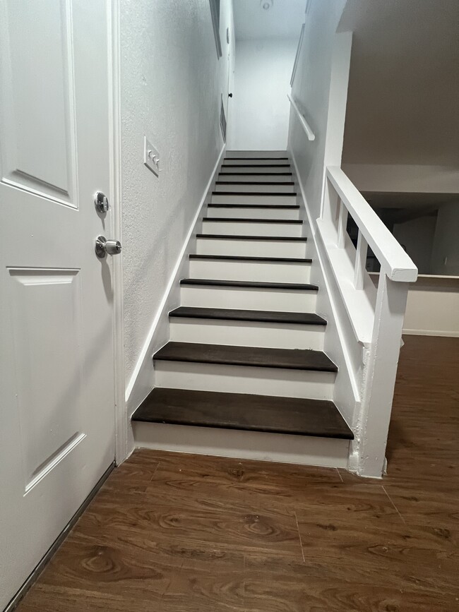 Newly installed hardwood stairs - 9010 Sedgemoor Trl