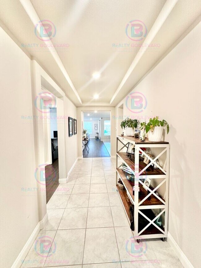 Building Photo - Welcome to your dream home, where modern elegance meets unparalleled convenience!