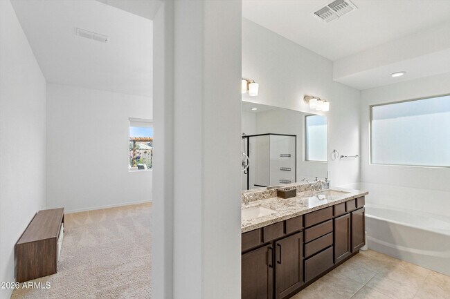 Building Photo - 10812 E Tesla Ave