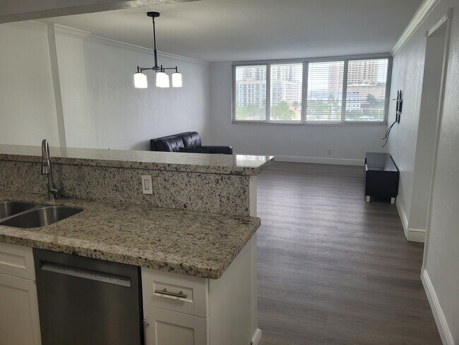 Open kitchen w granite countetop - 9143 SW 77th Ave
