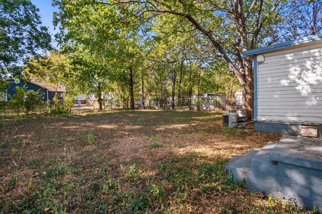 Building Photo - "Charming 2-Bedroom Duplex Retreat on Clou...