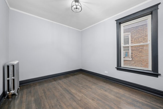 Building Photo - 6423 S Maplewood Ave