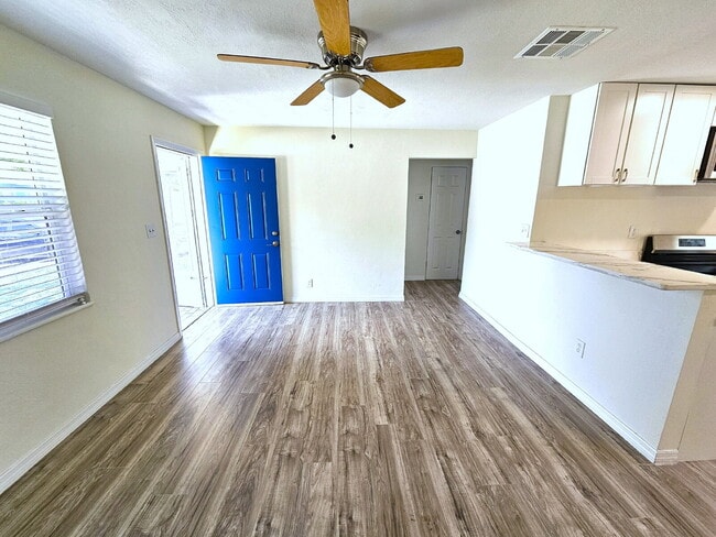 Building Photo - fully renovated 2-bedroom, 1-bathroom home with bonus guest room or office and oversized fenced yard