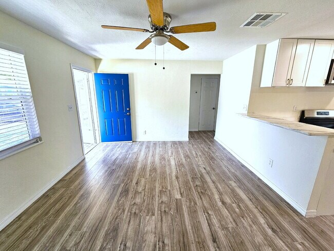 Building Photo - fully renovated 2-bedroom, 1-bathroom home with bonus guest room or office and oversized fenced yard