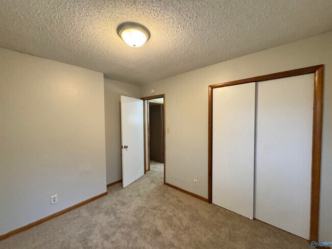 Building Photo - 3812 Melody Cir NE