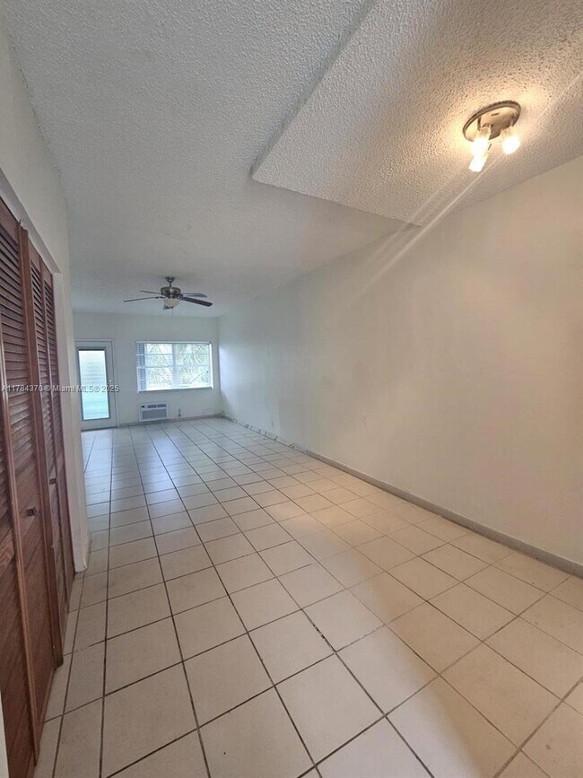 Building Photo - 6494 Collins Ave