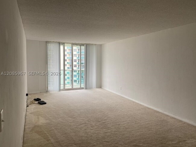 Building Photo - 19380 Collins Ave