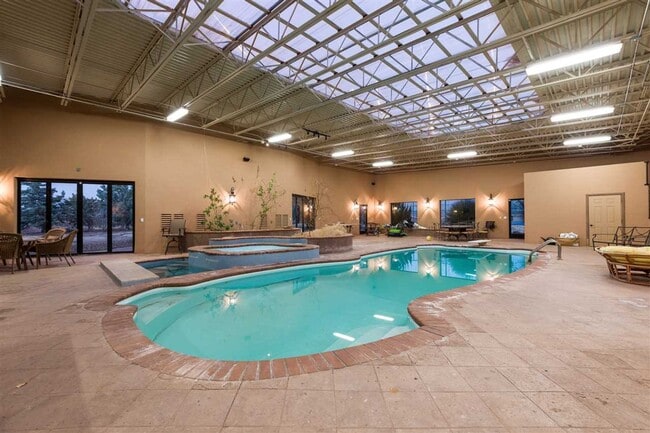 Building Photo - Furnished 5-Bedroom Home with Indoor Pool & Amenities