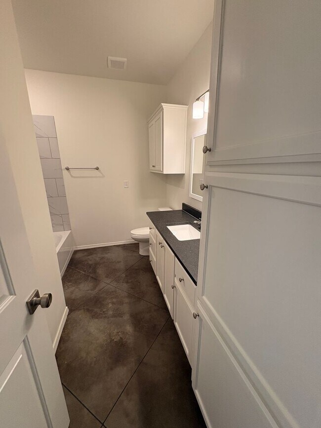 Building Photo - Stunning New 3/2 Townhomes