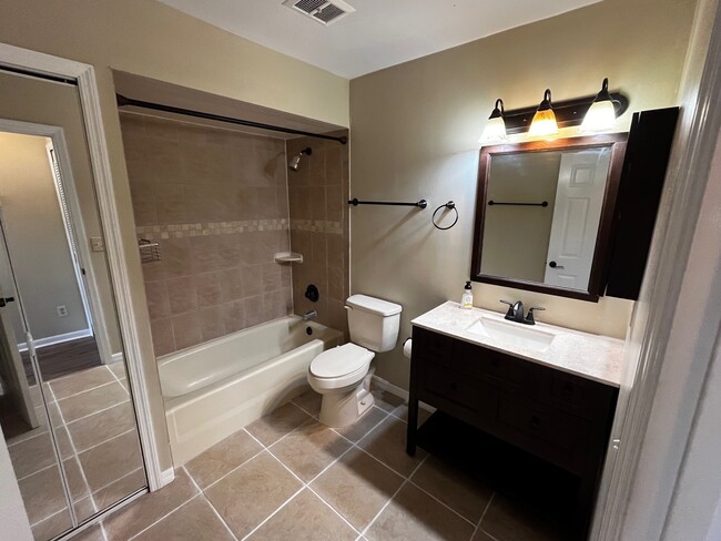 Upstairs bathroom with tub shower - 1694 SW Crossing Cir