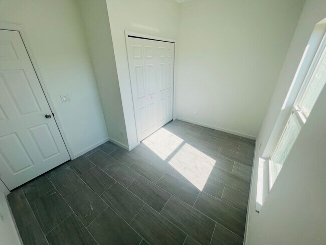 Building Photo - BRAND NEW 3/2/1 SINGLE FAMILY HOME--SW LEHIGH ACRES