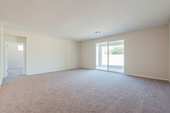 Building Photo - Beautiful New Spacious Home Includes 3 car...