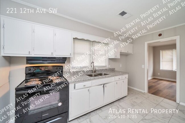 Building Photo - 221 12th Ave SW