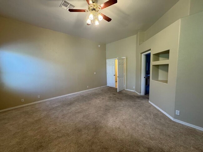 Building Photo - Spacious 4-Bedroom Home with Main-Level Primary Suite & 3-Car Garage