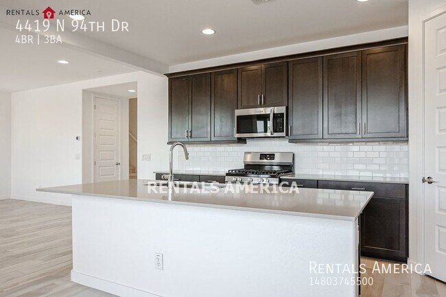 Building Photo - Gorgeous Open-Concept 4-Bedroom Home in a ...