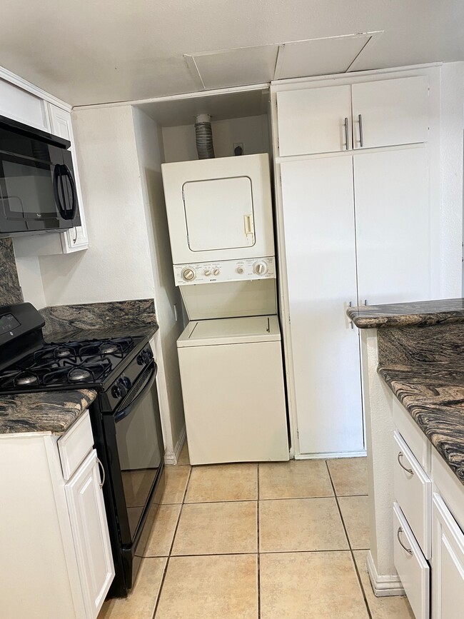 washer & dryer inside - 8463 De Soto Ave