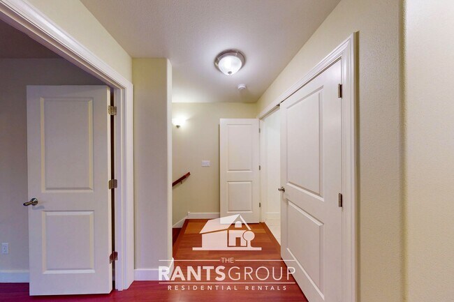 Building Photo - Meticulously Updated Townhome in Gated Community – Low Maintenance & Move-In Ready!