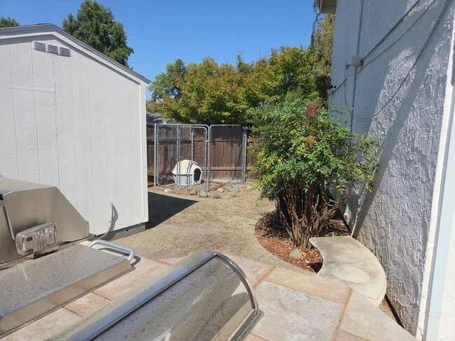 Building Photo - Spacious 5- Bedroom Home with Pool & Spa i...