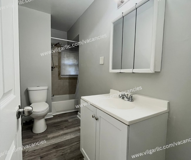 Building Photo - 6065 E 6th Pl