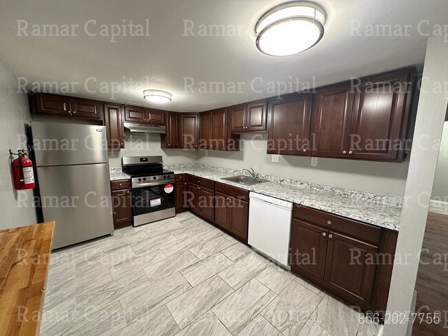 Building Photo - Stylish & Fully Furnished 3-Bedroom, 2-Bat...