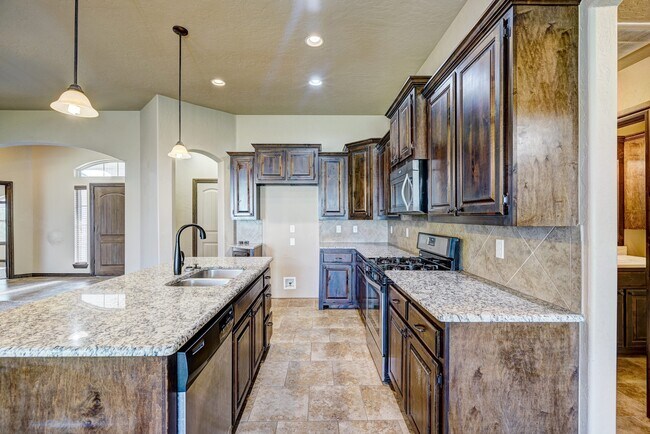 Building Photo - AVAILABLE THE END OF APRIL! 3 OR 4 BDRM, 2 BATHRM, 2 CAR & STORM SHELTER