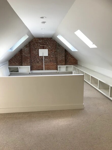 3rd floor with built-in A/C, large skylights, and TV hookup - 5A Evergreen Ave
