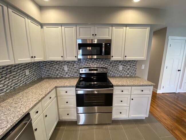 Building Photo - Central AVL - Farmhouse Charm, Modern Amen...