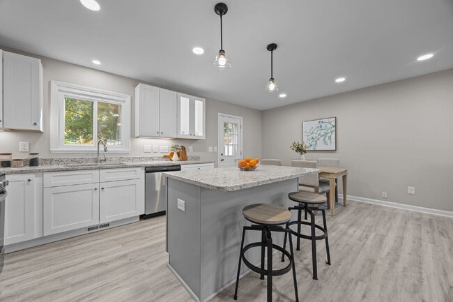 Building Photo - Charming 3-Bed Home with Granite Touches & Finished Basement in Raleigh!