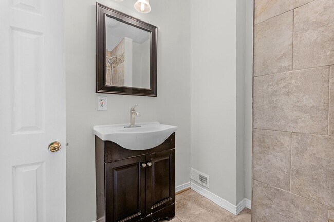 Building Photo - Charming Updated Rowhome in Belair-Edison – Move-In Ready!