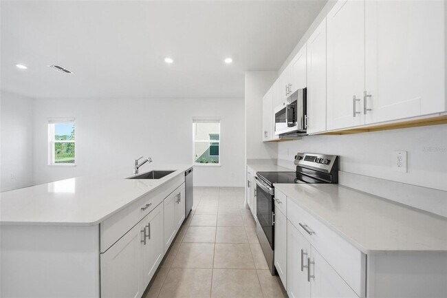 Building Photo - 8879 Coqui Song Ln