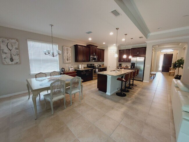 Building Photo - Luxurious Home in Toscana Isles Gated Community